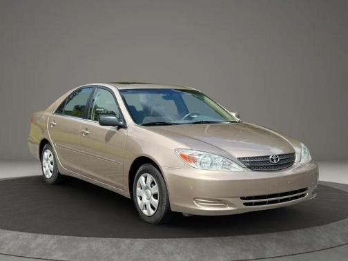Gold 2002 Toyota Camry LE