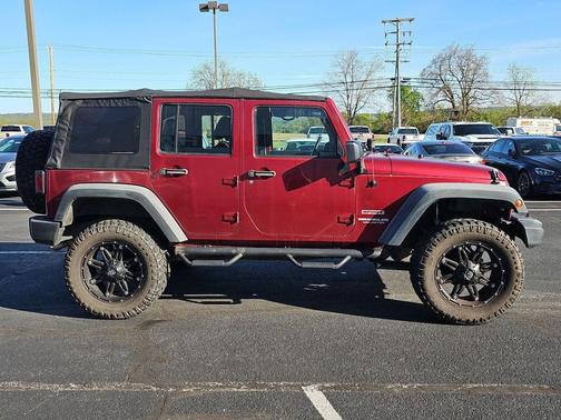 Maroon 2011 Jeep Wrangler Unlimited Sport