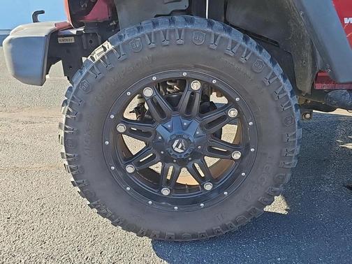 Maroon 2011 Jeep Wrangler Unlimited Sport