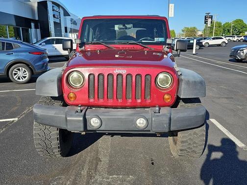 Maroon 2011 Jeep Wrangler Unlimited Sport