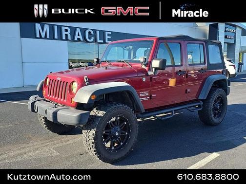 Maroon 2011 Jeep Wrangler Unlimited Sport