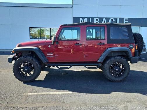 Maroon 2011 Jeep Wrangler Unlimited Sport
