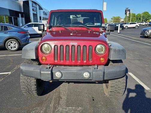 Maroon 2011 Jeep Wrangler Unlimited Sport