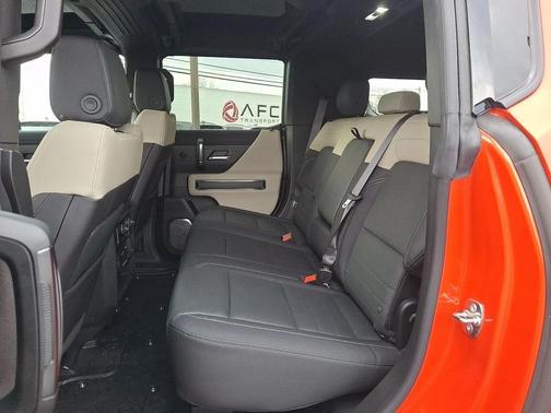 Solar Orange 2026 GMC HUMMER EV SUV 2X