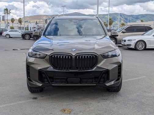 Manhattan Green Metallic 2026 BMW X5 PHEV xDrive50e