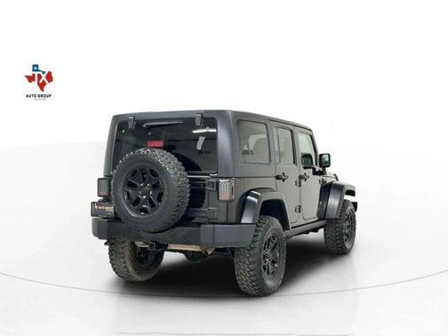 Black 2014 Jeep Wrangler Unlimited Sport