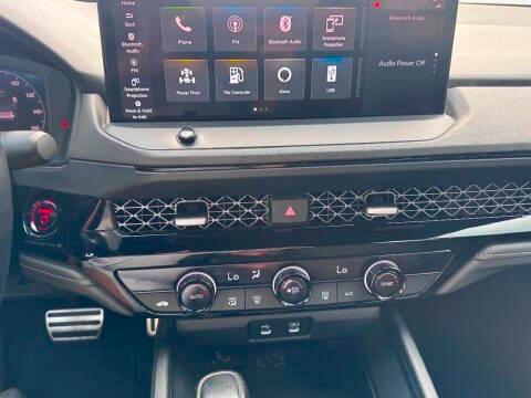 Red 2023 Honda Accord Hybrid Sport