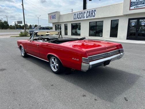 Red 1965 Pontiac GTO
