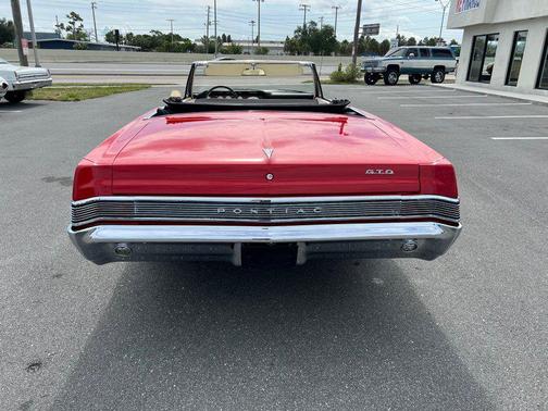 Red 1965 Pontiac GTO