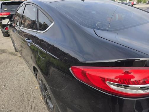 Agate Black 2019 Ford Fusion Hybrid SE