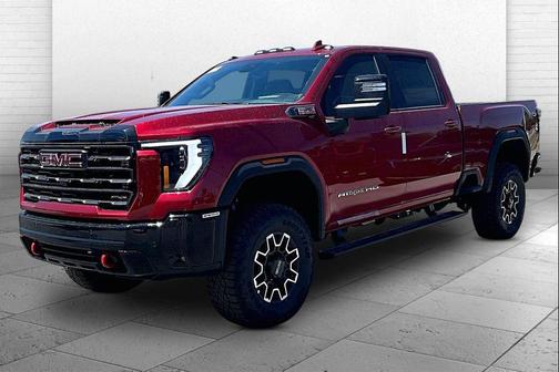 Volcanic Red Tintcoat 2026 GMC Sierra 2500 AT4X