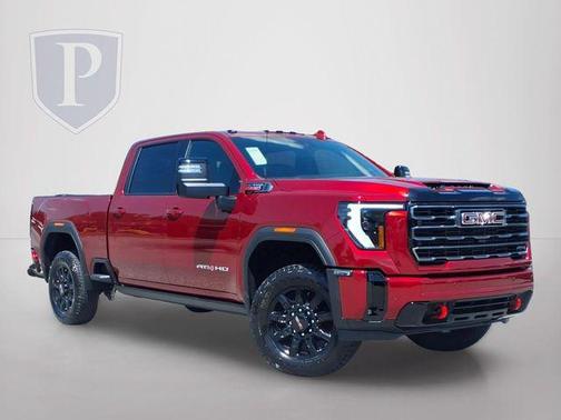 Volcanic Red 2026 GMC Sierra 2500 AT4