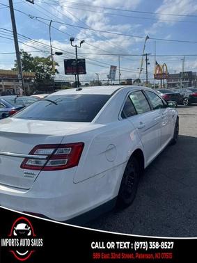 White 2013 Ford Taurus SEL