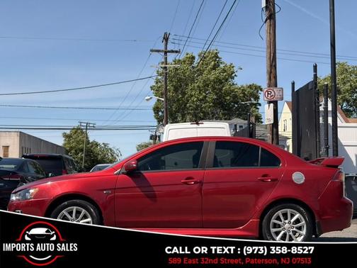 Red 2016 Mitsubishi Lancer SE
