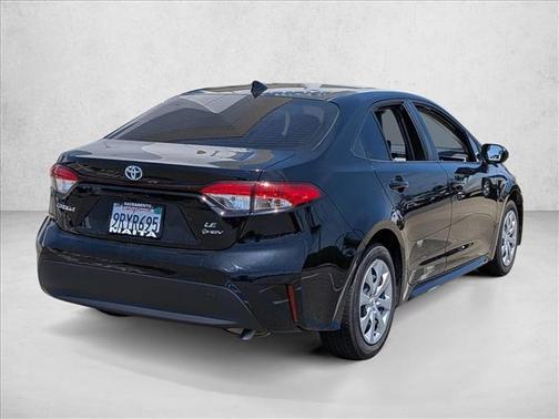 Midnight Black Metallic 2025 Toyota Corolla Hybrid LE