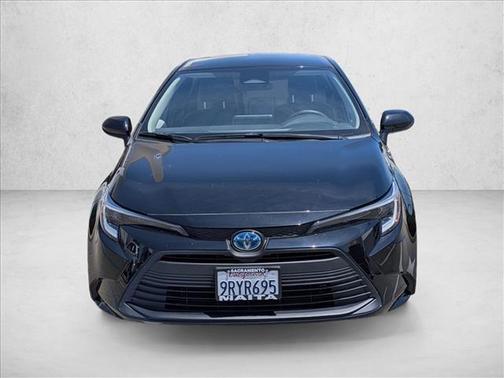 Midnight Black Metallic 2025 Toyota Corolla Hybrid LE