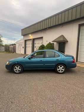 Vibrant Blue 2004 Nissan Sentra 2.5 S