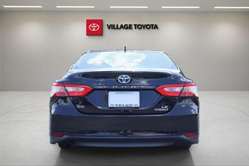 Midnight Black Metallic 2019 Toyota Camry Hybrid LE