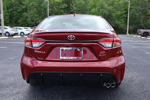 Ruby Flare Pearl 2026 Toyota Corolla Hybrid SE