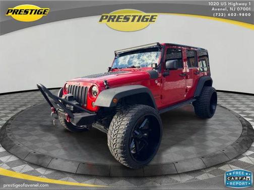 Red 2015 Jeep Wrangler Unlimited Sport