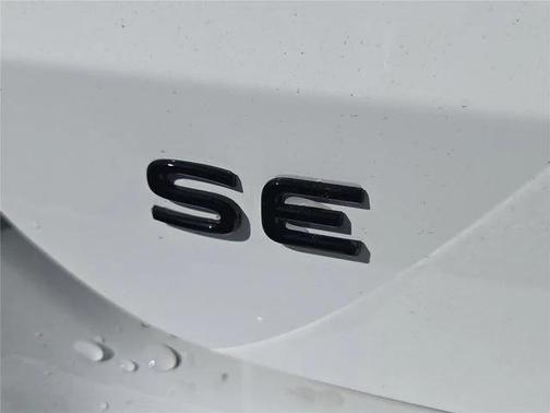 White   Black 2026 Volkswagen Taos SE Black