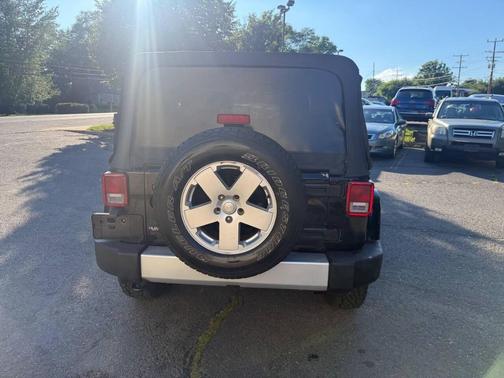 Black Clearcoat 2012 Jeep Wrangler Unlimited Sahara