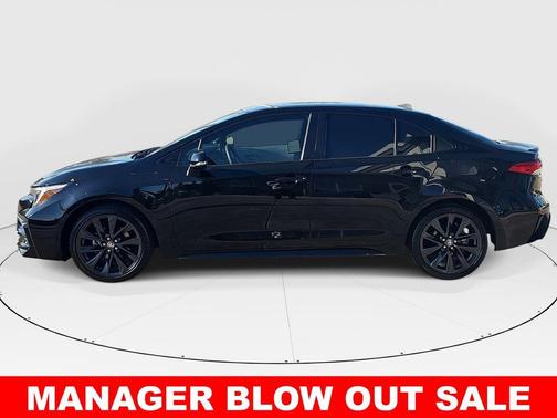 Midnight Black Metallic 2024 Toyota Corolla Hybrid SE