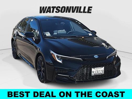 Midnight Black Metallic 2024 Toyota Corolla Hybrid SE