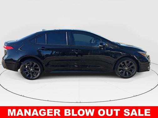 Midnight Black Metallic 2024 Toyota Corolla Hybrid SE