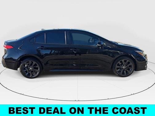 Midnight Black Metallic 2024 Toyota Corolla Hybrid SE