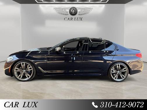 Carbon Black Metallic 2019 BMW M550 i Xdrive