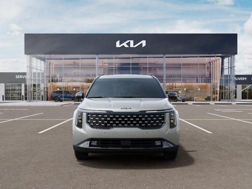 Ivory Silver 2026 Kia Carnival Hybrid SX