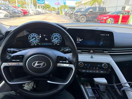 Ultimate Red Metallic 2024 Hyundai ELANTRA HEV Limited