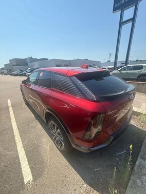 Radiant Red Tintcoat 2025 Cadillac OPTIQ Sport 2 AWD