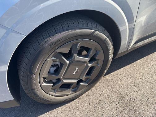 Ceramic Silver 2026 Kia Carnival Hybrid SX