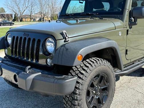 Green 2016 Jeep Wrangler Sport