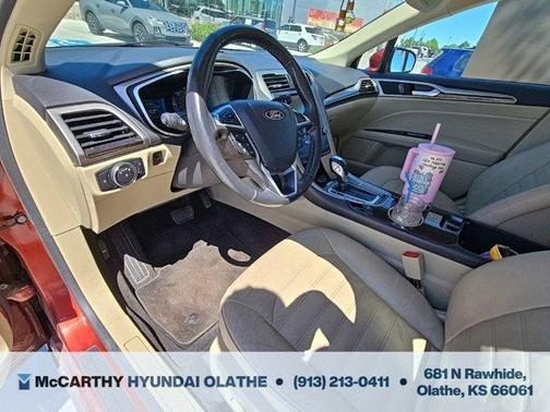 Sunset 2014 Ford Fusion Hybrid SE