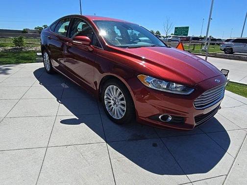 Sunset 2014 Ford Fusion Hybrid SE