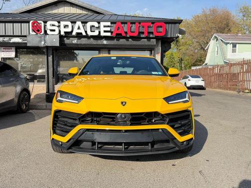 Yellow 2019 Lamborghini Urus Sport Utility 4D