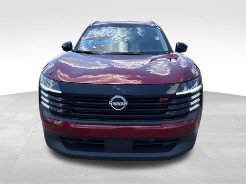 Scarlet Ember Tintcoat 2026 Nissan Kicks SR