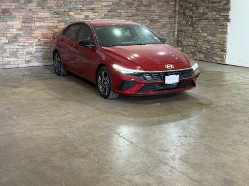 Red 2025 Hyundai ELANTRA HEV SEL Sport
