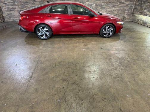 Red 2025 Hyundai ELANTRA HEV SEL Sport