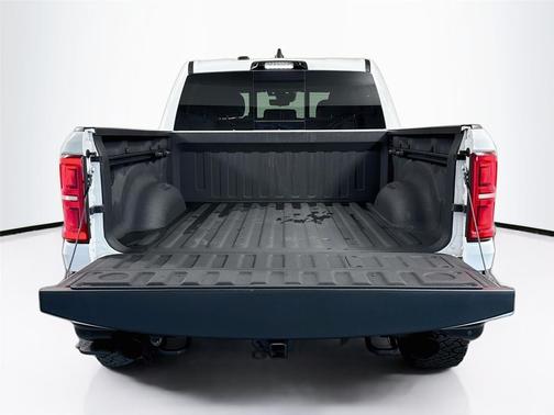 Bright White Clearcoat 2025 RAM 1500 RHO Crew Cab 4x4 5'7' Box