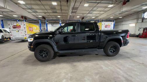 Diamond Black Crystal Pearlcoat 2026 RAM 1500 RHO Crew Cab 4x4 5'7' Box
