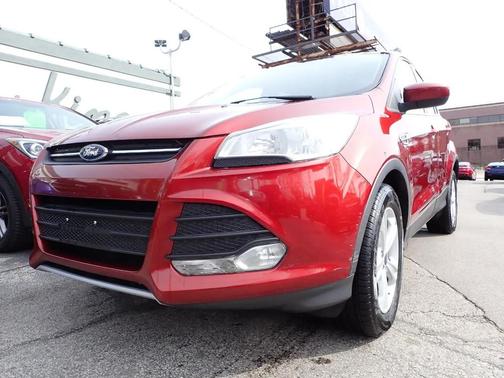 Orange 2015 Ford Escape SE