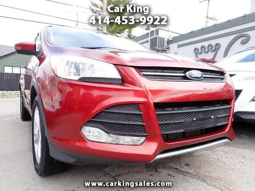 Orange 2016 Ford Escape SE