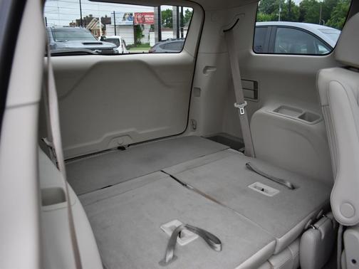 Volcanic Red Tintcoat 2023 GMC Acadia Denali
