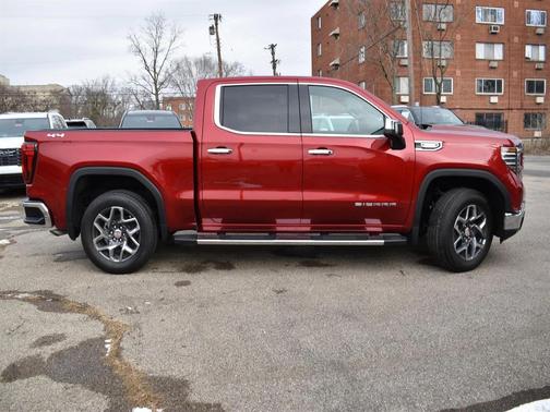 Volcanic Red Tintcoat 2026 GMC Sierra 1500 SLT