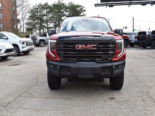 Volcanic Red Tintcoat 2026 GMC Sierra 1500 AT4X