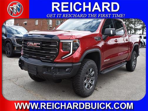 Volcanic Red Tintcoat 2026 GMC Sierra 1500 AT4X